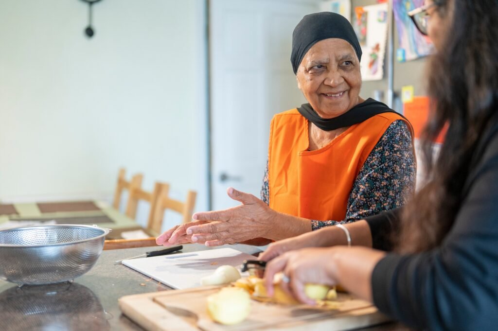 A woman volunteering and making food for people A woman volunteering and making food for people