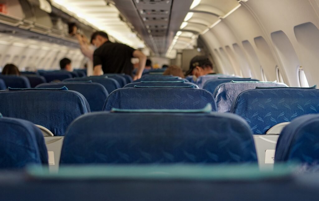 the inside of an aircraft cabin the inside of an aircraft cabin