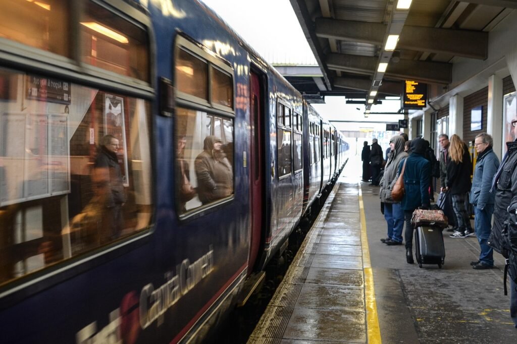A train arriving at a train station A train arriving at a train station
